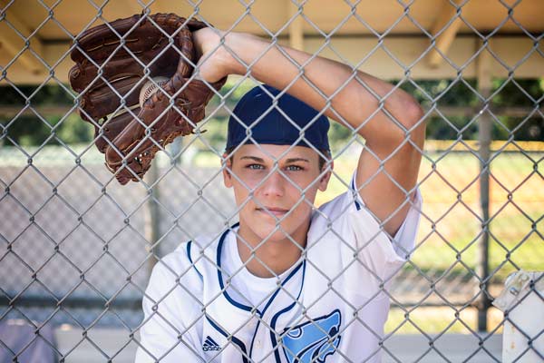 Baseball Catcher in The Dugout in Franklin TN | Baseball Senior Photos Moments By T