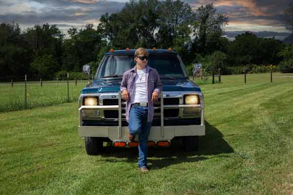 Senior Boy Standing With Truck in Franklin TN | Senior Portraits Moments By T